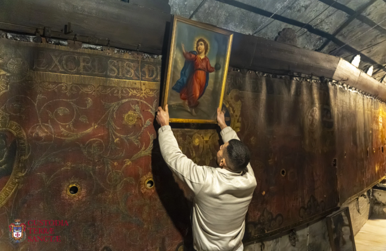 A painting taken down from the draped wall of the grotto of the Nativity.